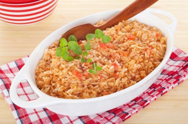 CHICKEN and SPANISH RICE Chicken pieces of your choice simmered with rice, tomatoes, onion, bell pepper and spices. This is a delicious and filling dish that you won't be able to get enough of.