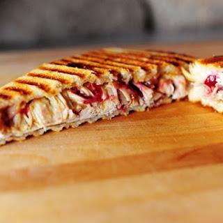 DASH CRANBERRY SWISS PANINI This is a delicious lunch time sandwich or snack; the cranberries have many health benefits for you, cranberries have anti inflammatory benefits, helps protect against