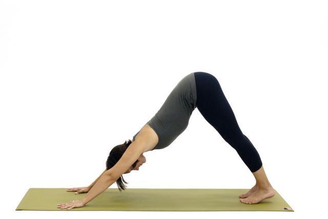 DOWNWARD FACING DOG Downward facing dog stretches and strengthens the whole body. Downward facing dog is done many times during most yoga classes.
