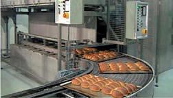 After this process, the pans are fed into the MCS oven, type Bakemaster. From the oven exit the pans are transported to the Depanner, where the buns are taken off.