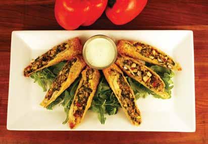 Crispy Favorites Southwest Egg Rolls 10 Flour tortillas filled with shredded chicken, black beans, corn, jack cheese, spinach & red peppers. Served with creamy avocado ranch.
