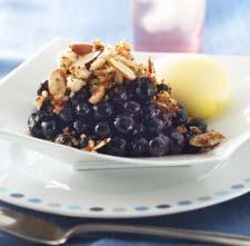 -5- QUICK AND LIGHT BLUEBERRY BETTY 1/3 cup blueberry preserves 3 cups fresh or frozen blueberries 5 slices white bread, torn into pieces 2 tablespoons butter 3 tablespoons sliced almonds 3