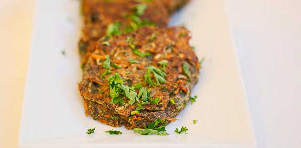 Very Veggie Cakes ½ pound zucchini, trimmed, coarsely grated (about 1 large or 2 medium) ¼ pound carrots, peeled, coarsely grated (about 2) 2 green onions, chopped (optional) 1 Tbsp apple sauce ½ cup