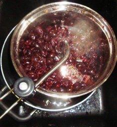 Step 5 - Strain the cooked, softened cherries A cylindrical food strainer, like the Roma or Vittorio work best.