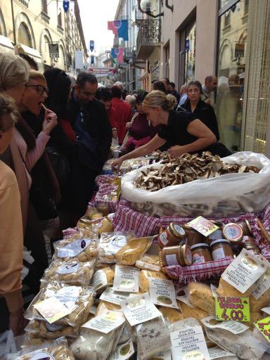 vendors selling artisanal local specialties such as baked goods, cheese,