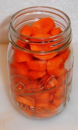 Step 9 - Packing the carrots in the canning jars This is called "hot packing"! Fill the jars with the hot carrots and onions, leaving 1-inch headspace.