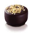 Brésilienne Our signature hazelnut praliné coated in smooth milk chocolate and rolled in crispy caramelized hazelnuts Truffe Framboise a raspberry-flavoured, dark chocolate mousse, enrobed in