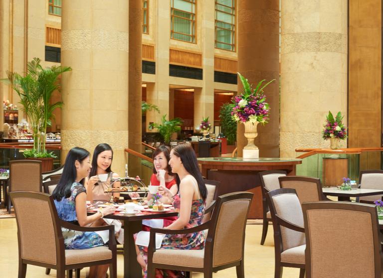 THE FULLERTON HOTEL SINGAPORE Top: The Courtyard, Bottom (left to right): Singapore High Tea Buffet at Town, Heritage Coffee at The Courtyard The Courtyard While away a leisurely afternoon in the