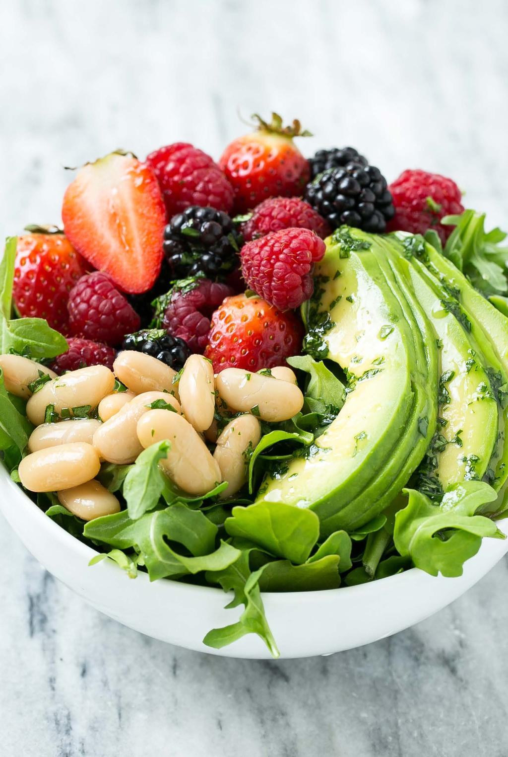 Bowls 17. Summer Salad Bowl Fresh berries, avocado and white beans are combined with arugula and tossed in a cilantro vinaigrette for an easy meal.