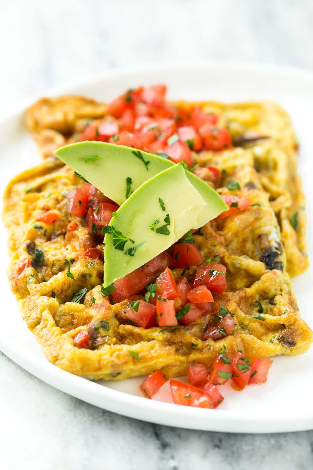 6. Omelet Waffles Eggs mixed with sauteed vegetables and cooked in a waffle maker. Top your omelet waffles with diced tomatoes, herbs and avocado for a satisfying breakfast.
