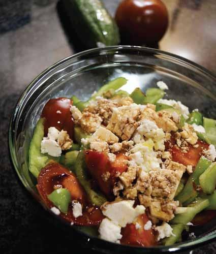 GREEK SALAD............................................................................................................ with feta Greek Salad with Feta In a large bowl, combine the cucumber, lettuce, tomatoes.