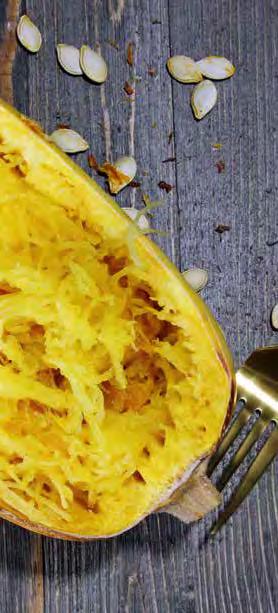 SPAGHETTI SQUASH WITH KALE PESTO 4 6 Servings 1 medium-size spaghetti squash ½ cup pine nuts ½ cup fresh basil ½ cup kale Juice of 1 lemon 1 2 cloves garlic ¼ cup extra-virgin olive oil Sea salt and