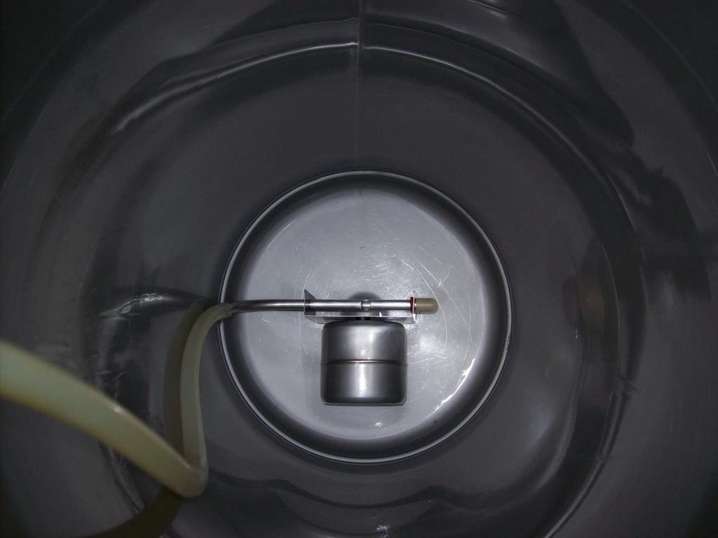 The float assembly gently lowered into the keg.