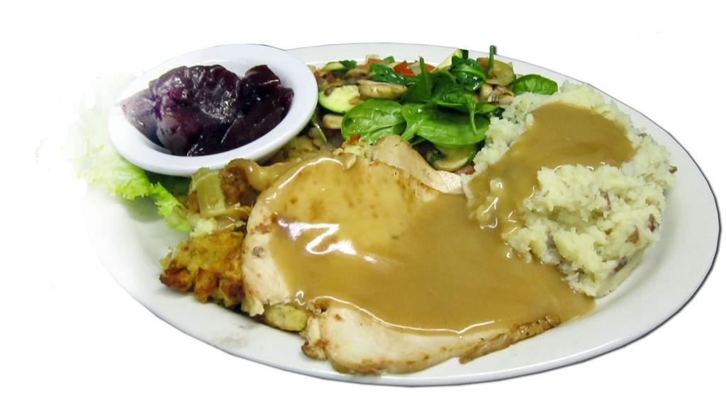 Our turkey breast is baked in our ovens and topped with turkey gravy. Served with stuffing and cranberry sauce. 13.
