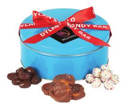 CHOCOLATE TRIO TIN Because the best things always come in threes, so does these yummy chocolate treats! Our signature turquoise tin comes fi lled to the top with three signature favorites.