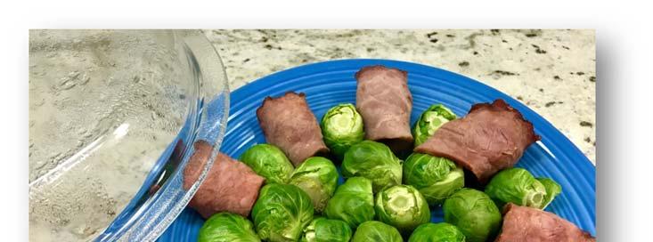 Cut Bacon in half, wrap around Sprouts leaving unwrapped Sprouts in the