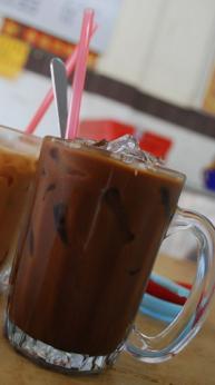 Iced Coffee (serves 1) 300 calories, 11g protein 1-2 teaspoons of instant coffee powder 2 tablespoons of sugar Mix well until coffee powder has dissolved, then serve with ice.