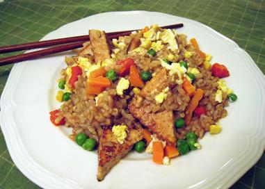 Crispy Tofu Triangles with Fried Rice Prep + Cook: 30 minutes Servings: 6 I served this meal to vegetarians and Midwestern steak eaters (even an avowed tofu-hater from Texas) and all agreed it was
