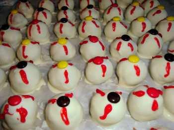 Scary Eyeballs Source: adapted from Bakerella, Recipe Girl, and Culinary in the Country Makes 50 eyeballs 1 package spice cake mix 1 tub cream cheese frosting 3 packages white chocolate chips, I use