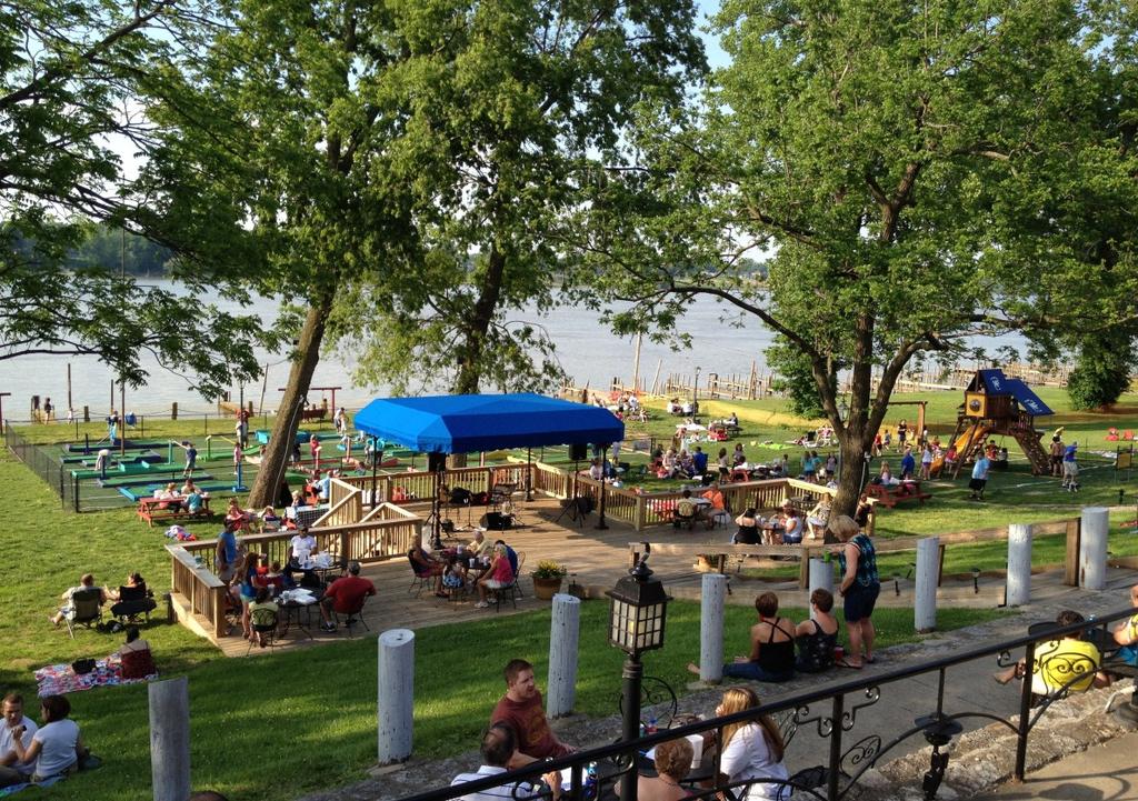 The Jeffersonville location has a covered patio area with a large bar only steps from the waters edge and boasts