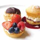 Kentish strawberries, mini victoria sandwich and mini berry tartlet with a pool of raspberry coulis French Fancy - Two mini macaroons sandwiched with a vanilla cream - pastel colour of your choice, a