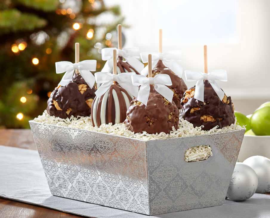 99 Unforgettable Shining Bright Caramel Apple Tray An elegant collection of six Caramel Apples in our most popular flavors: two each of Triple Chocolate,