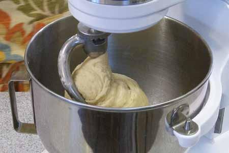 5 4 Place the bowl on the stand mixer and attach the dough hook. With the machine operating on low, add the salt.