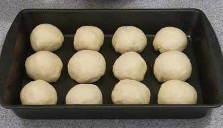 9 6 Shape each piece into a ball and arrange in a greased baking pan.