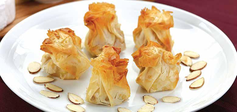 Dessert Brie With Sweet Pears & Toasted Almonds in Phyllo Purse Creamy Imported Brie cheese complemented by sweet pears, toasted almonds with cinnamon and