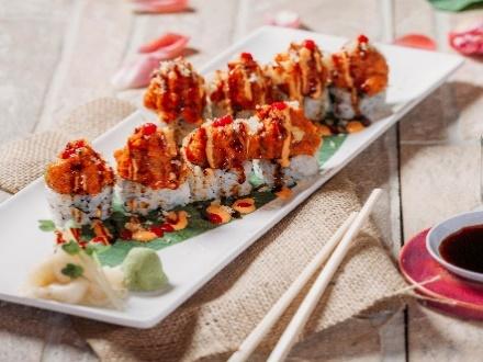 RAINBOW ROLL (8 pieces).. $10.00 California roll inside, on top assorted fresh fish and avocado. SPICY RED DRAGON ROLL (8 pieces)...... $10.00 Crunchy roll inside, on top spicy tuna and chili sauce.