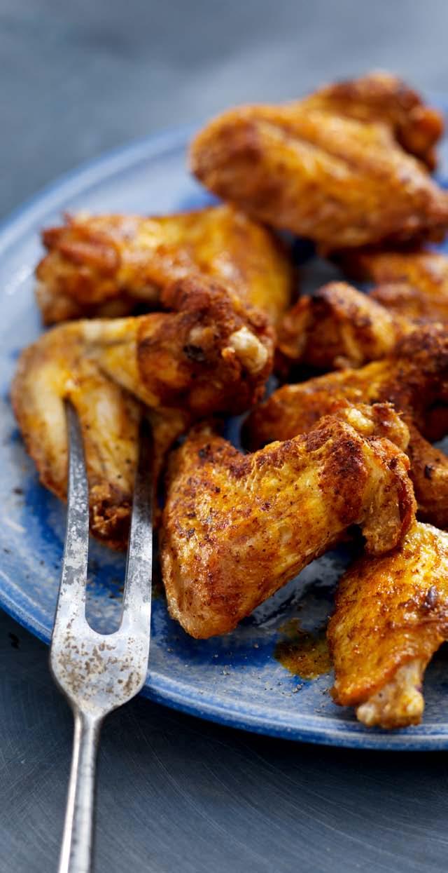Roasted Asian Chicken Wings Main course 4 por tions 5 minutes + 10 minutes airfr yer 2 cloves garlic 2 teaspoons ginger powder 1 teaspoon ground cumin Freshly ground black pepper 500 g chicken wings