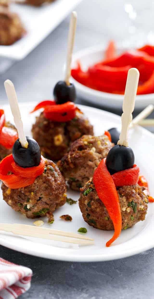 Meatballs with Feta Appetizer 10 por tions 10 minutes + 8 minutes airfr yer 150 g lamb mince or lean minced beef 1 slice of stale white bread, turned into fine crumbs 50 g Greek feta, crumbled 1