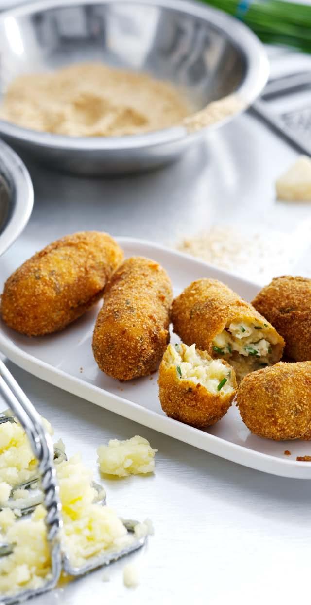 Potato Croquettes with Parmesan Cheese Side dish 4 por tions 30 minutes + 8 minutes airfr yer 300 g starchy potatoes, peeled and cubed 1 egg yolk 50 g Parmesan cheese, grated 2 tablespoons flour 2