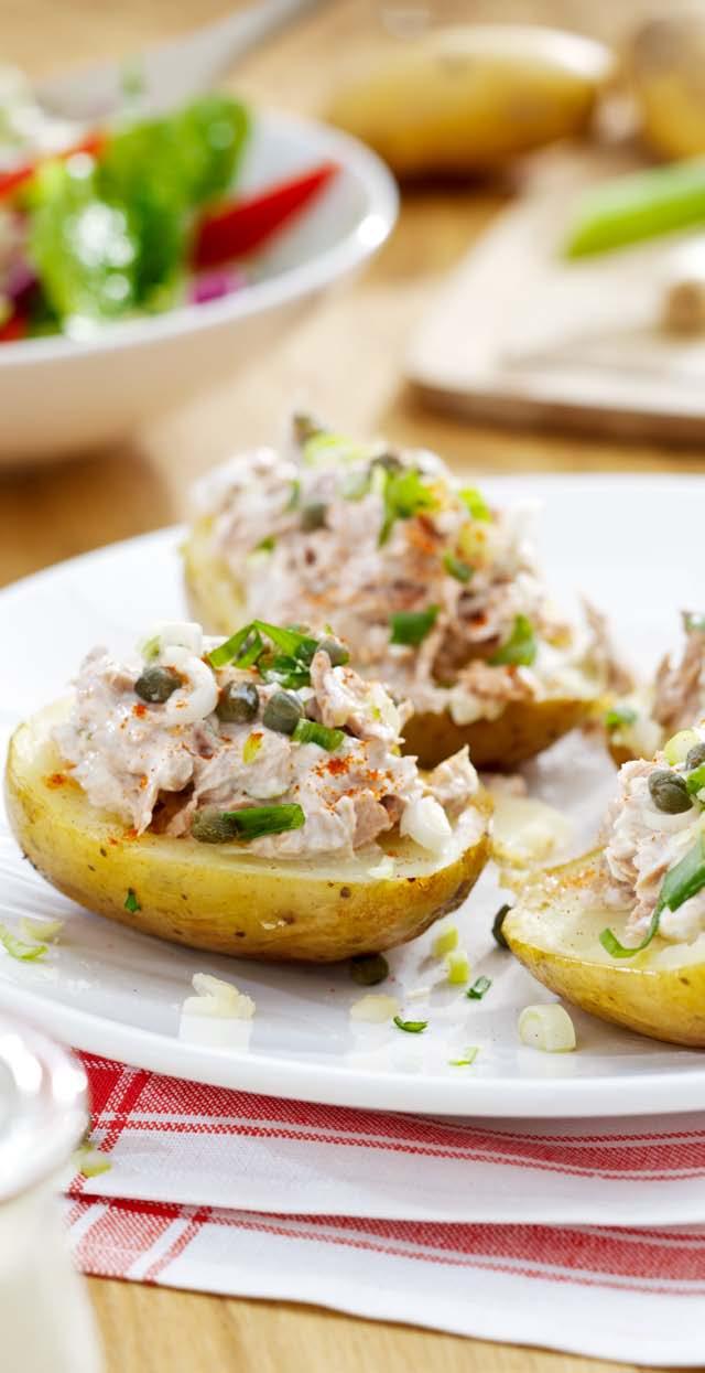 Roast Potatoes with Tuna Main course 2 por tions 10 minutes + 30 minutes airfr yer 4 starchy potatoes, approximately 125 g each ½ tablespoon olive oil 1 can of tuna in oil, drained 2 tablespoons