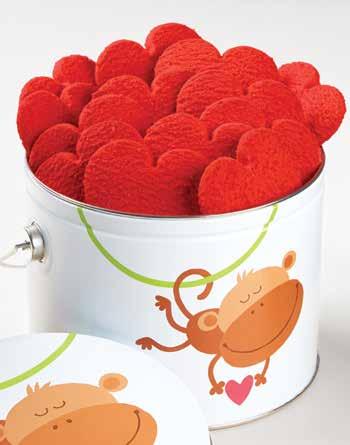 A A MONKEY LOVE SAMPLER TIN Their hearts just might skip a beat with these tasty Red Heart utter ookies, Valentine Fruit Sours and 2 flavors of popcorn: heese and Dark