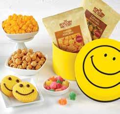 99 SMILEY DOT DELUXE SAMPLER This sunny assortment features Soft-baked hocolate hunk ookies, Red Licorice Twists, two Popcorn alls, Kiddie Mix, Mini Rainbow Pretzels, Natural Pistachios, and 5