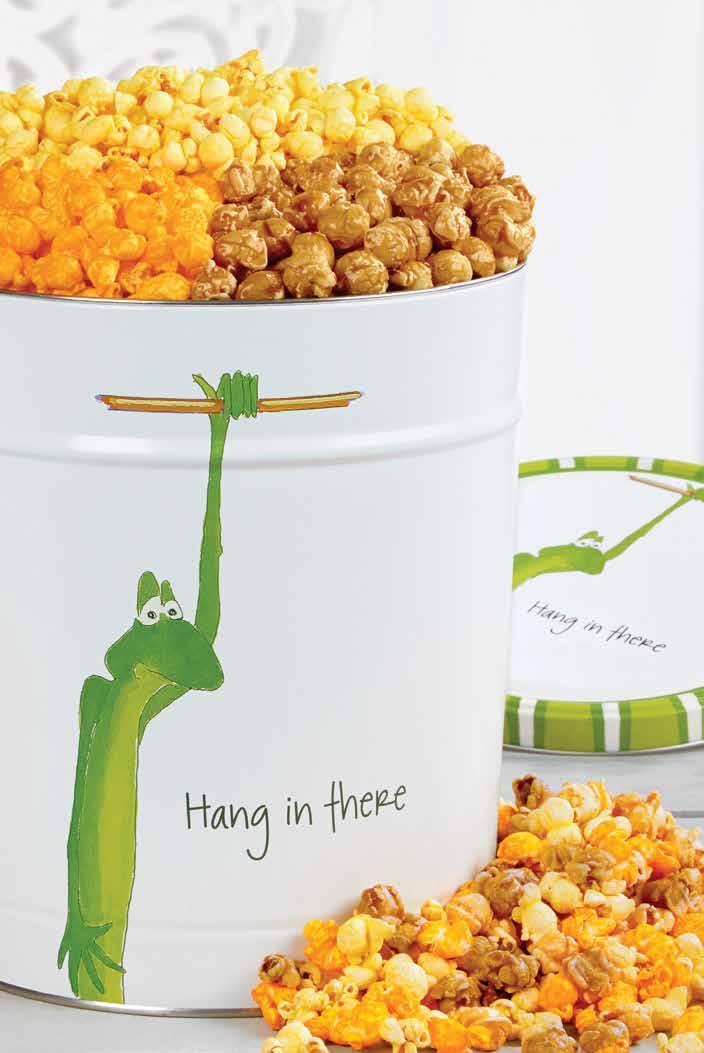 A Perfect Pick-Me-Ups A HANG IN THERE POPORN TIN Put a spring back in their step with a popcorn pick-me-up featuring one lovable frog.