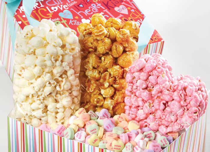 99 D LOVE OUT LOUD 6-TIER TOWER Love overflows from this 6-tier tower filled with Milk hocolate Popcorn ites, Neapolitan Taffy, a