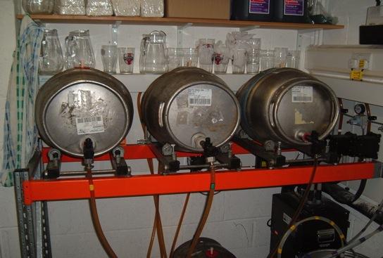 The Pub Cellar and Cask Beer Casks lined up on stillage ready to Serve auto tilts Can be