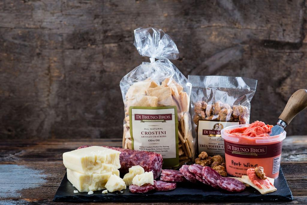 A FOUNDATION OF MUST-HAVE MEATS AND CHEESES Slice up our New York Aged Cheddar and layer between a crunchy Olive Oil Crostini and our artisan salami for a bite that s so perfectly Italian.