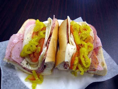 FRESH FOOT-LONG HOAGIES All hoagies include lettuce, tomato, onion & oregano. Hot and/or sweet peppers, oil, vinegar and/or mayo available by request at no additional charge.