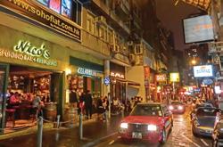 Road ), next to LKF, is a more chic and relaxed place. Famous for its outdoor escalator, it has something to suit any taste, from Peruvian cocktails to upmarket wine selections.