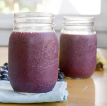 Lean Wild Berry Smoothie Prep: 10 minutes Makes: 2 servings Ø 1 frozen banana Ø 2 Tablespoons raw almond butter Ø 1 cup ice Ø ½ cup frozen blueberries Ø 1