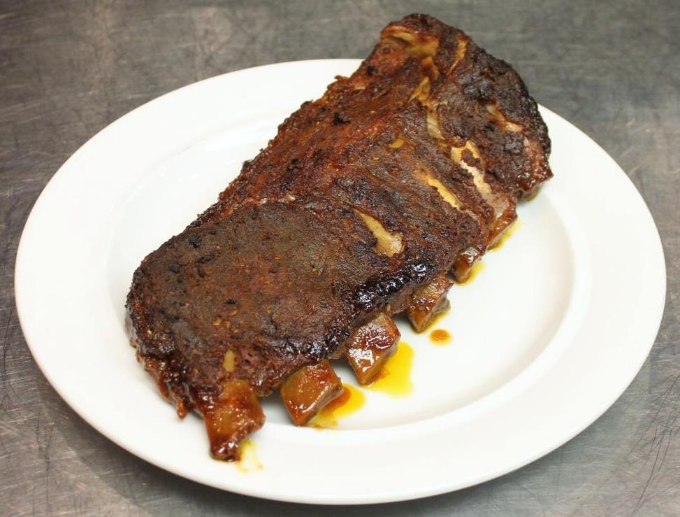 Pork Spare Ribs with Sauce 1. Use full racks of enhanced St. Louis Style ribs or pork spare ribs 2. Score or remove silver skin 3. Liberally apply topical seasoning 4.