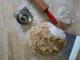 Turn the dough onto a well-floured surface and knead in extra flour to produce a firm dough which can be rolled.