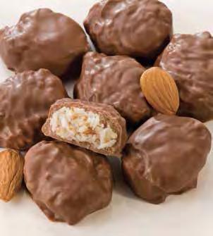 00 Pecanbacks Chocolates con nueces Plump pecans are covered with fresh caramel then drenched in
