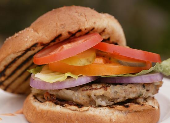 Turkey Burger The ground 99% lean turkey breast used in this recipe is a healthier alternative to a traditional beef burger because it is lower in saturated fat.