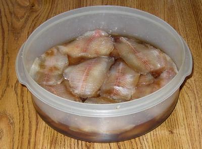 so of salty liquid sucked out of the fillets by the salt and sugar. This reduces the size of each piece of fish.