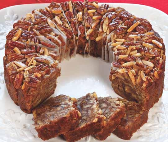 Apple Cinnamon Pecan Cake Orchard-fresh apples sprinkled with cinnamon and native pecans are blended into our honey-rich batter, then