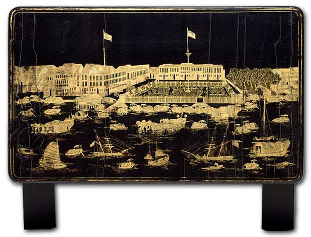 This is one of a set of four lacquer nesting tables depicting Canton, Macau, Bocca Tigris, and Whampoa, ca. 1830 to 1845. The American garden with its large fence is in the center.
